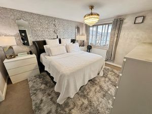 Bedroom One- click for photo gallery